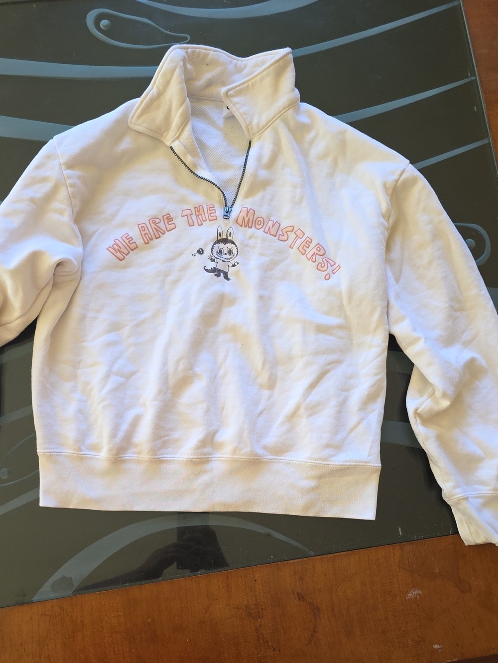 Uniqlo Light Pink Half-Zip Sweatshirt with Pink Graphic